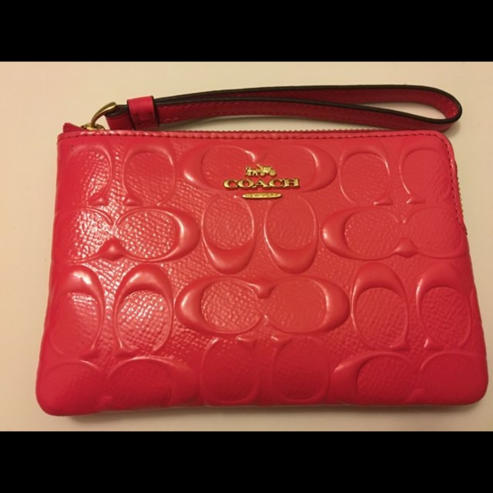 Brand new Coach wristlets embossed  pink